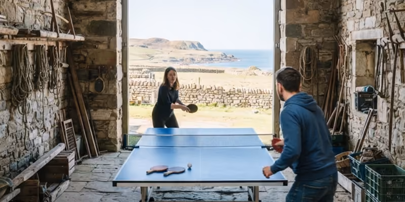 A game of table tennis in the old stone byre